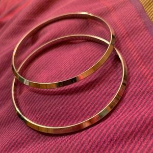 2 different sets of bracelets together